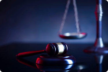 A gavel and a court balance - Leckerman Law, LLC