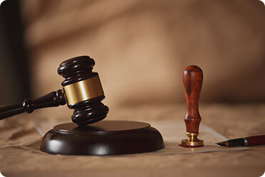 A judge's gavel and pen - Leckerman Law, LLC