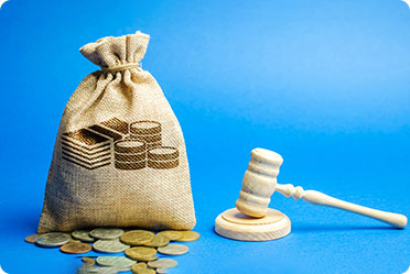 A small gavel and a sack having money - Leckerman Law, LLC