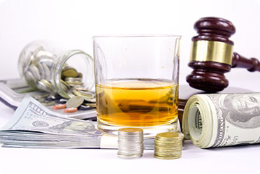 Alcohol, money and a gavel - Leckerman Law, LLC