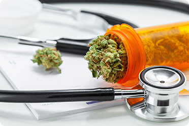 Medical marijuana and stethoscope - Leckerman Law, LLC