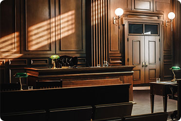 A courtroom with elegant wooden paneling - Leckerman Law, LLC