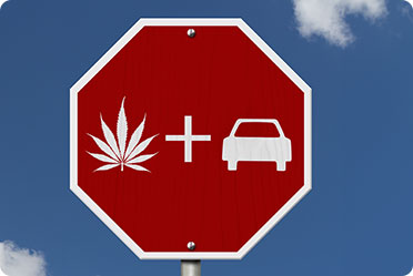 A red stop sign with a marijuana leaf and a car - Leckerman Law, LLC