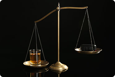 A scale having glass and key - Leckerman Law, LLC