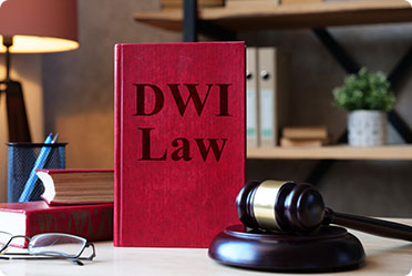 DWI Law book and gavel on desk, symbolizing New Jersey DWI enforcement transformation.